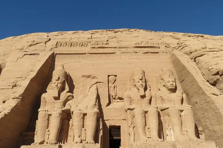 The four seated colossi of Ramesses II at the Great Temple of Abu Simbel on a luxury Egypt tour, Abu Simbel, Egypt
