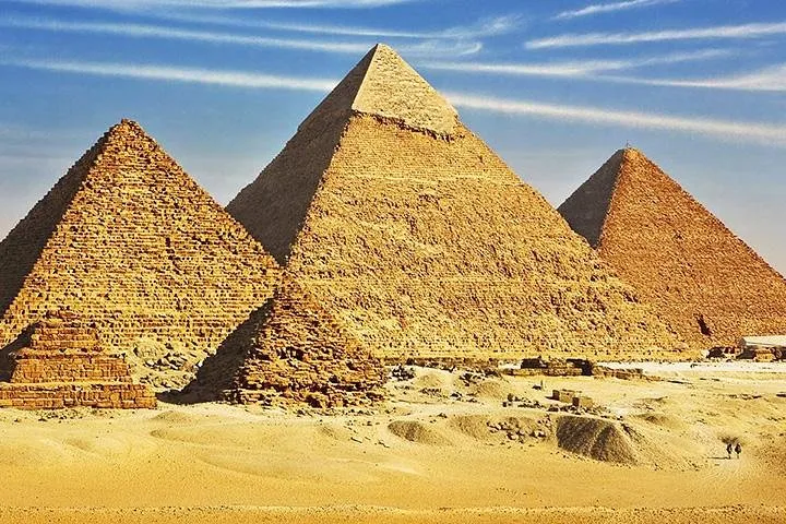 The three pyramids of Giza under a blue sky on an 8-day luxury Egypt tour package, Giza, Egypt