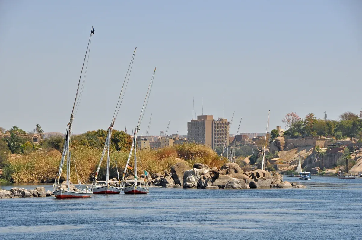 Feluccas moored among the granite islands of the Nile at Aswan, the southern end of a luxury Egypt tour cruise
