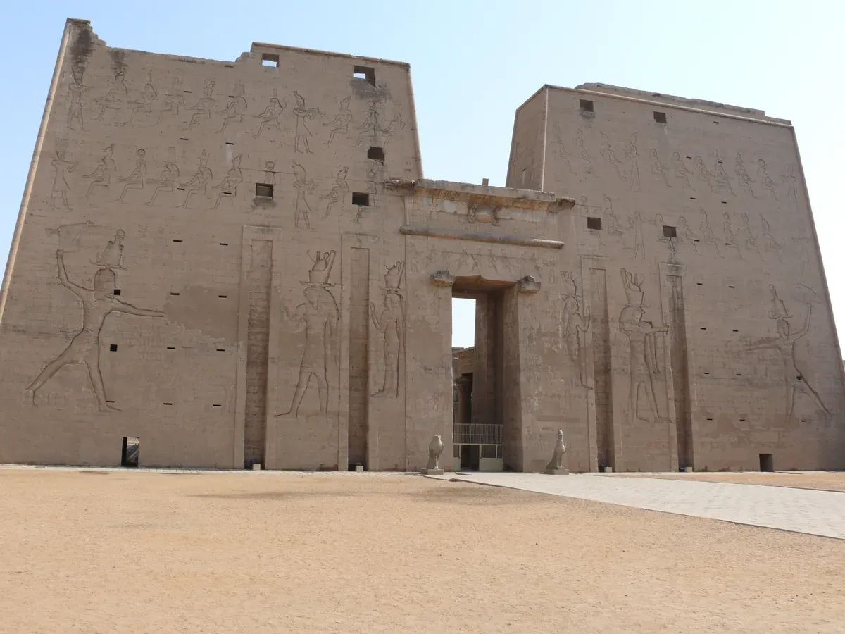 The pylon of the Temple of Horus at Edfu on a luxury Egypt tour Nile cruise