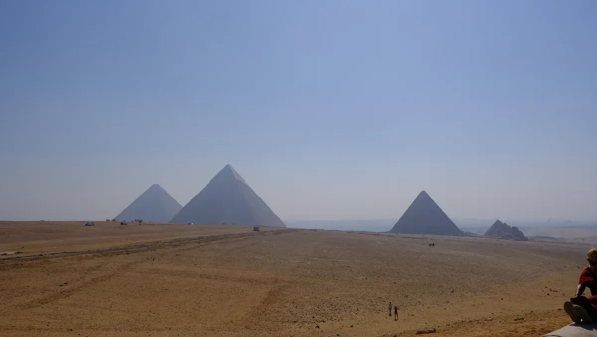 The three main pyramids rising over the Giza plateau on a luxury Egypt tour, Giza Plateau, Cairo, Egypt